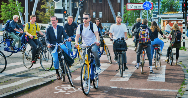 people biking in amsterdam