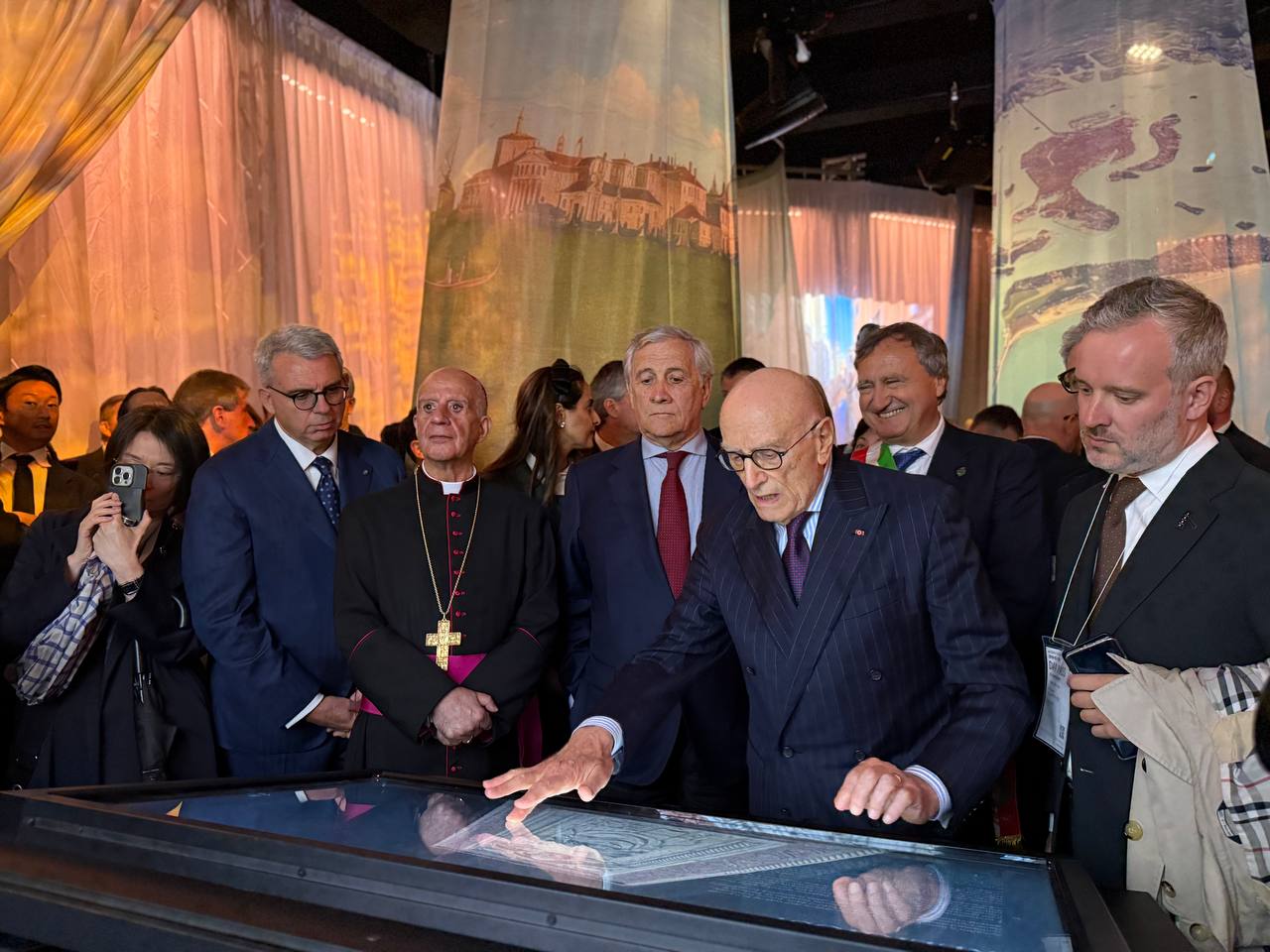 amb. Vattani showing the interactive device to the guests